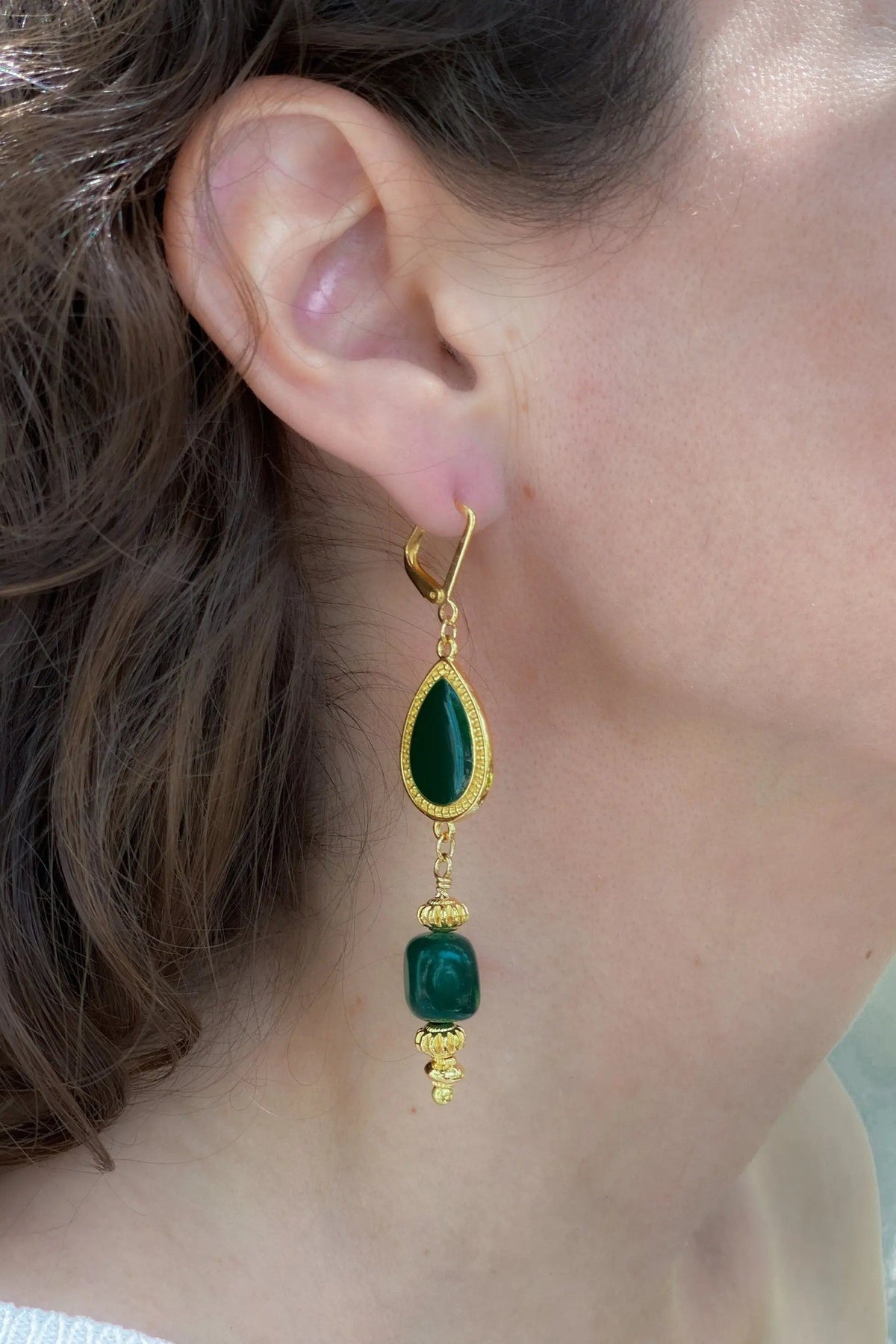 ROXANI Emerald Green drop earring with deep green stones, gold-tone settings, and dangling bead details
