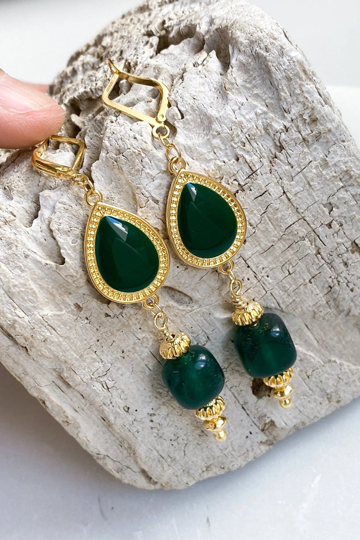 ROXANI Emerald Green statement earrings with glossy dark green teardrop stones, gold-tone beaded frames and dangling beads
