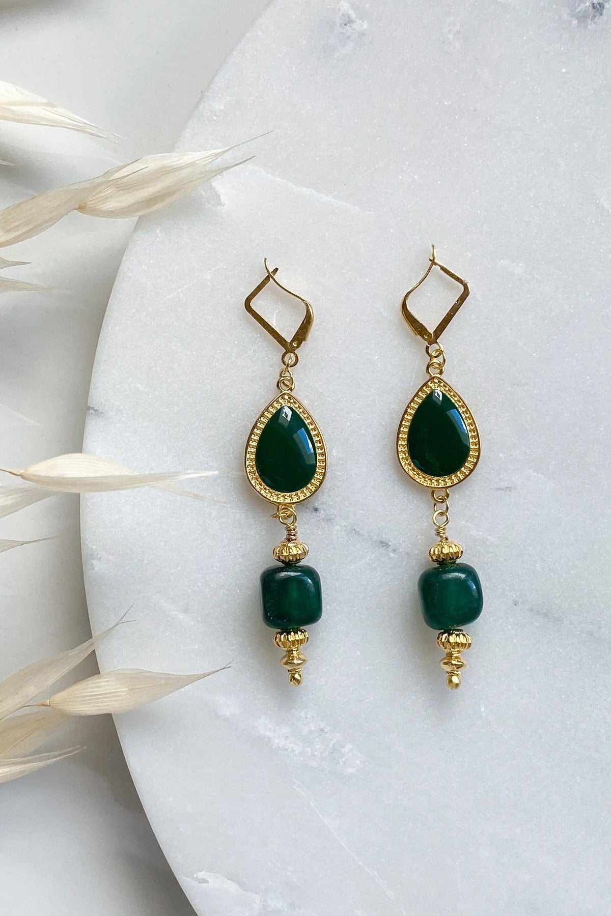ROXANI Emerald Green earrings in gold-tone metal with deep green teardrop and square stones, finished with gold bead details