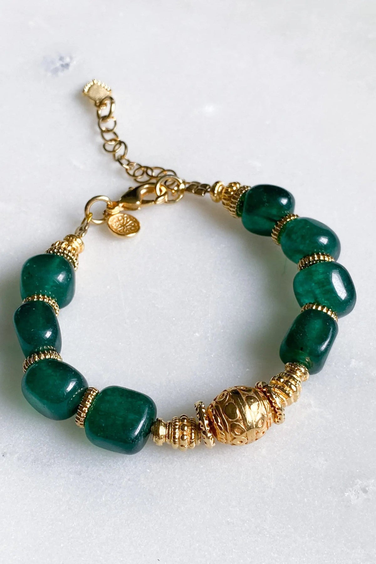 ROXANI Emerald Green bracelet with polished jade-green beads, gold-toned spacers and an ornate gold centerpiece