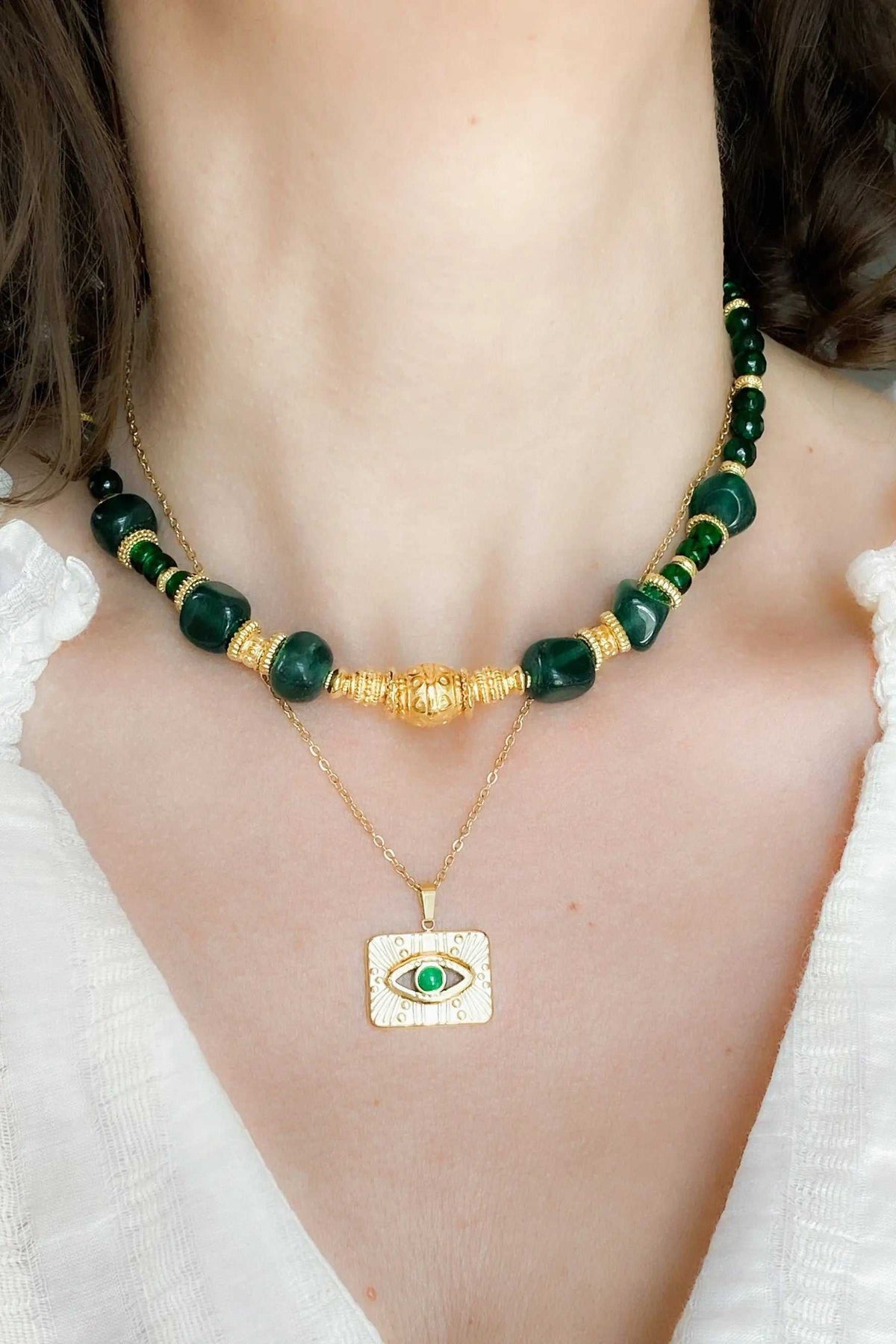 ROXANI Emerald Green Jade neckla beaded necklace with dark green stones, gold details, and eye pendant