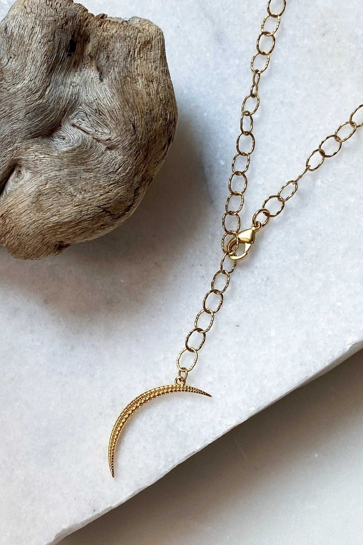 SELENE Moon Lariat Necklace with gold-tone oval-link steel chain and textured crescent moon pendant