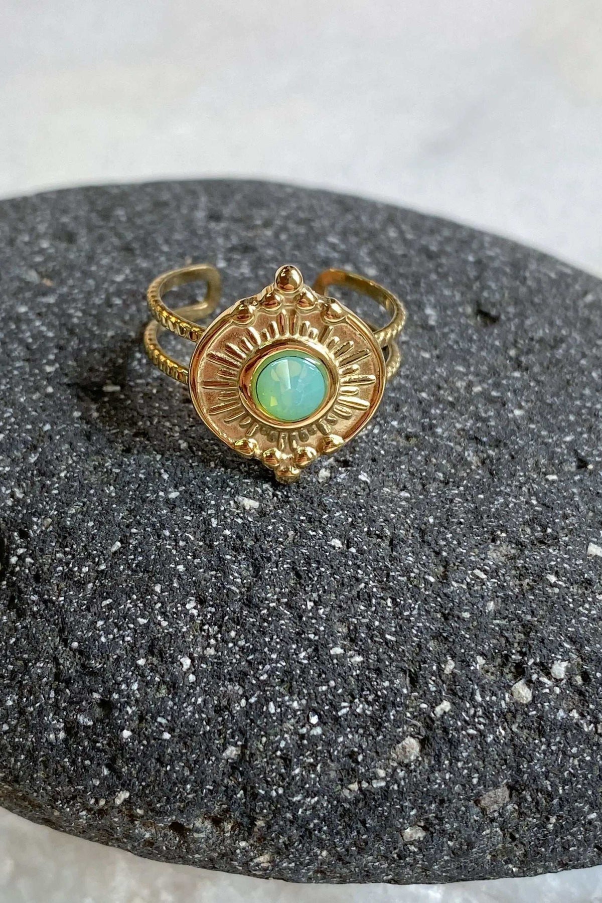 SEZAN Gold Stone Ring in ornate gold-tone metal, featuring a round turquoise-green stone and an adjustable open band