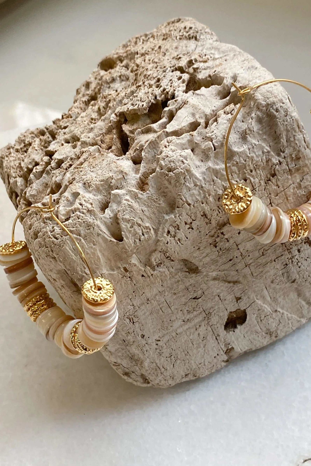SHELL Hoop earrings with cream and pale pink shell heishi beads, gold-tone hoops and decorative textured caps