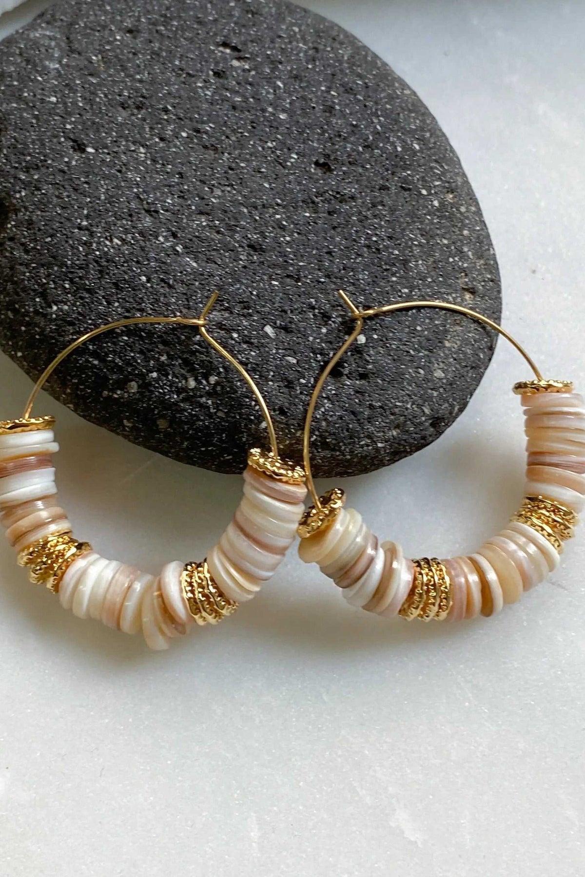 SHELL Hoop earrings with large gold hoops, cream natural shell heishi beads, and textured gold spacers