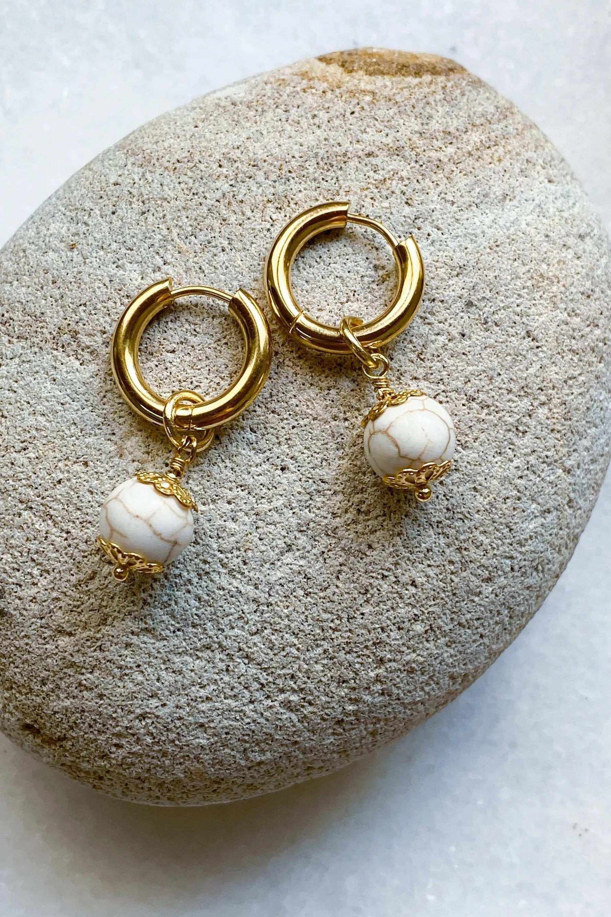 SORAYA medium earrings, gold huggie hoop earrings with white veined howlite gem charms