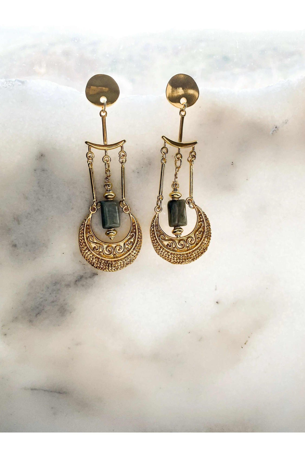 Statement Boho Earrings in gold-tone metal with green rectangular stones, ornate filigree and dangling chains