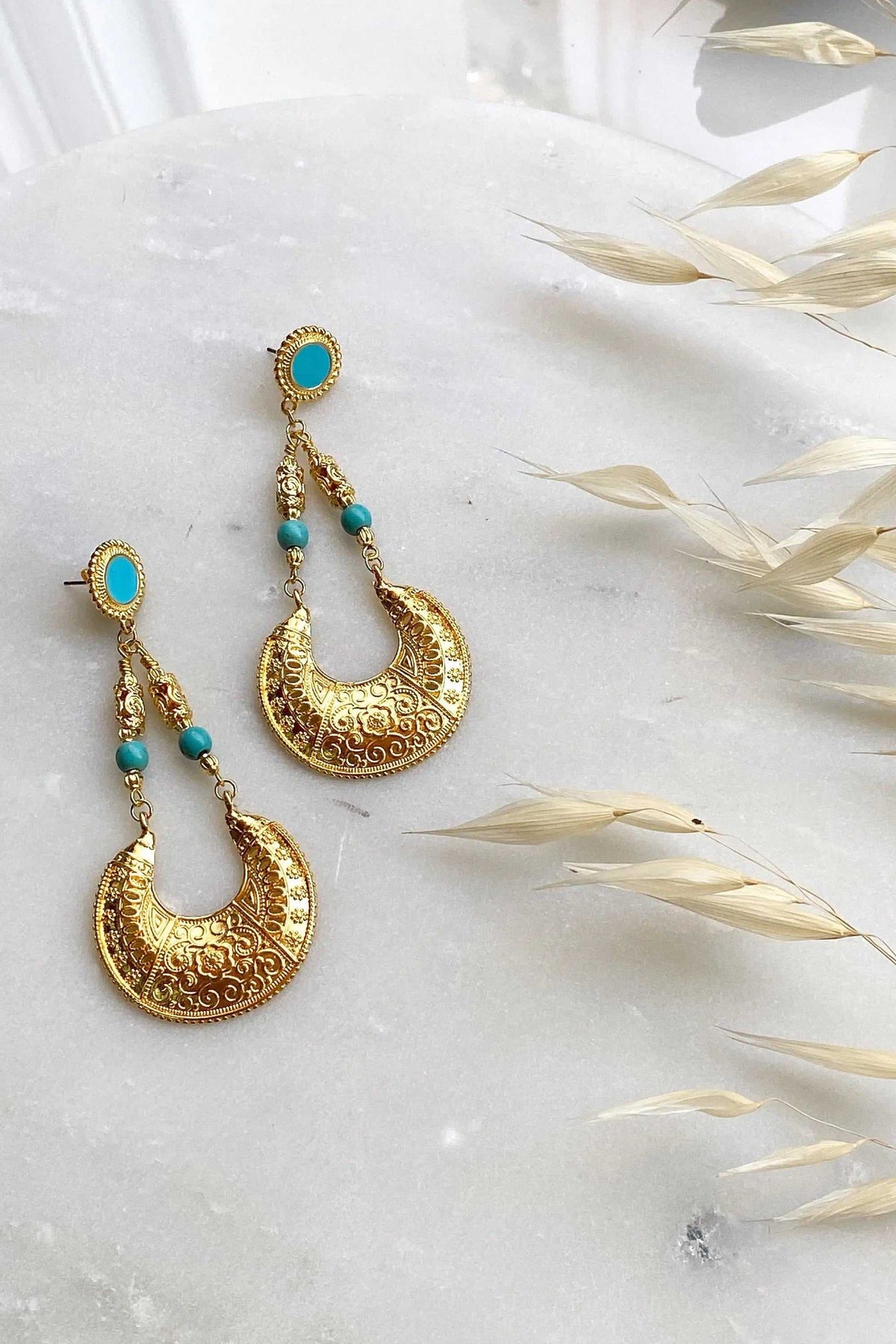 Statement oversize earrings in gold-tone filigree with turquoise oval studs and turquoise bead accents