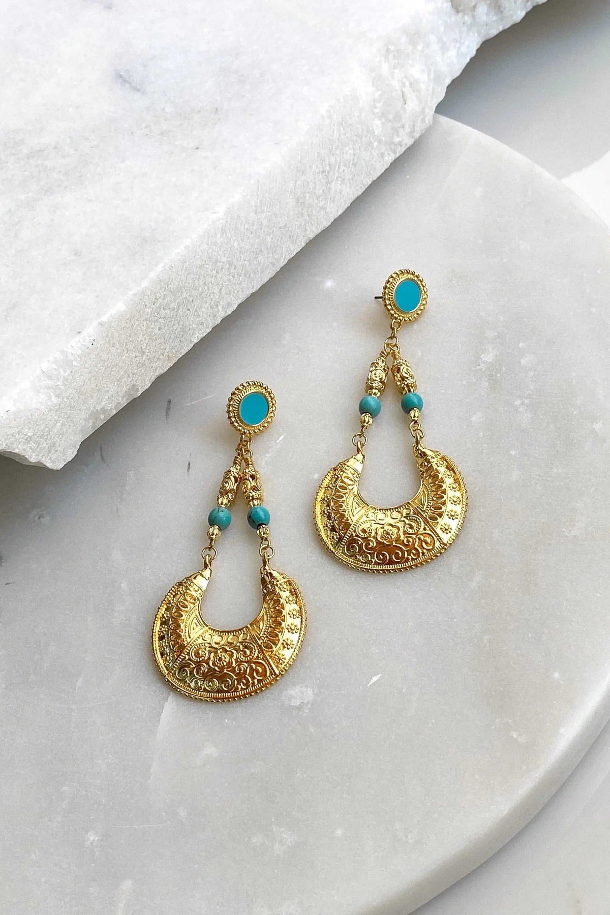 Statement oversize earrings in ornate gold-tone filigree with turquoise oval studs and bead accents