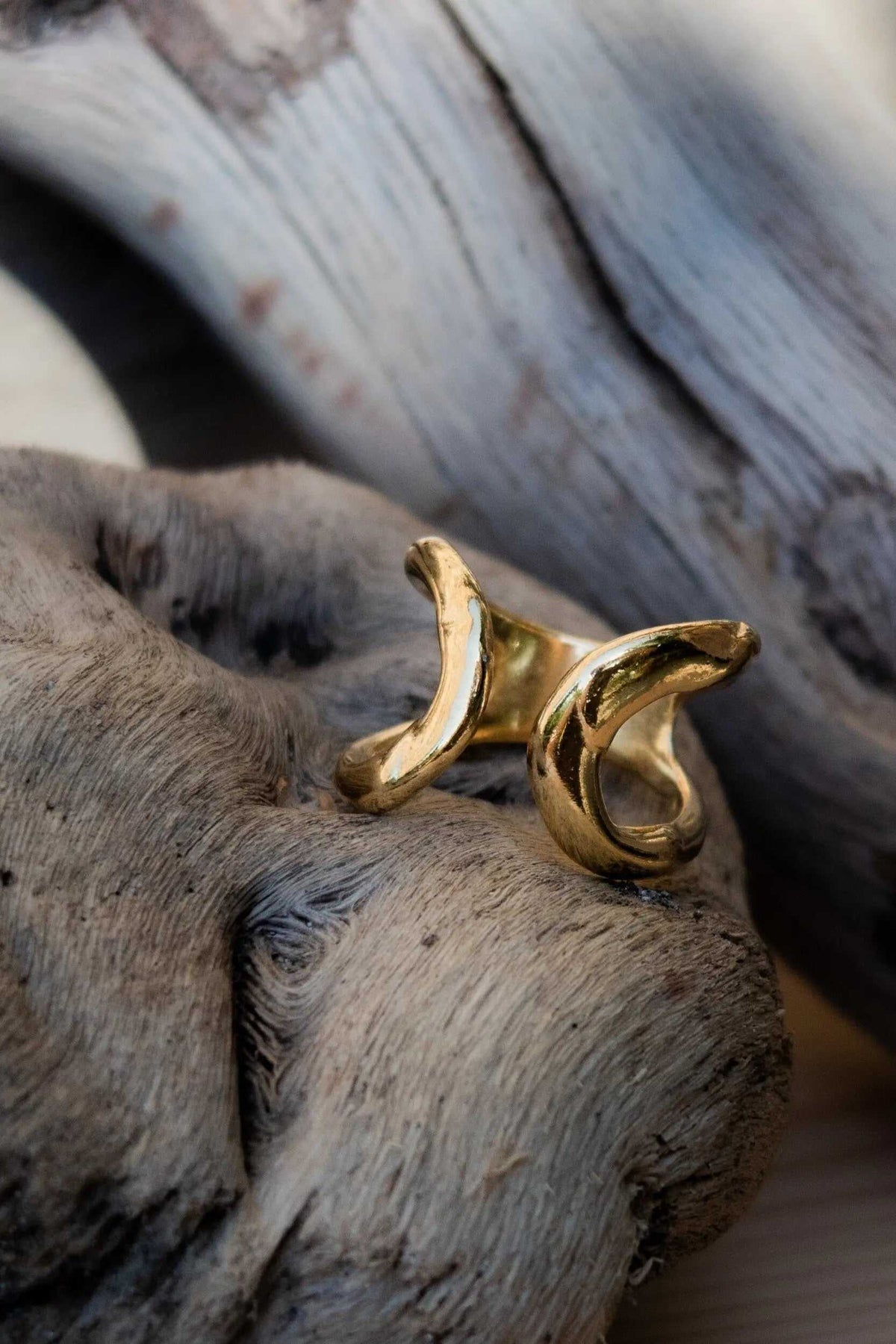Wide Organic RING in gold-tone metal, with a wide sculptural band and irregular flowing curves