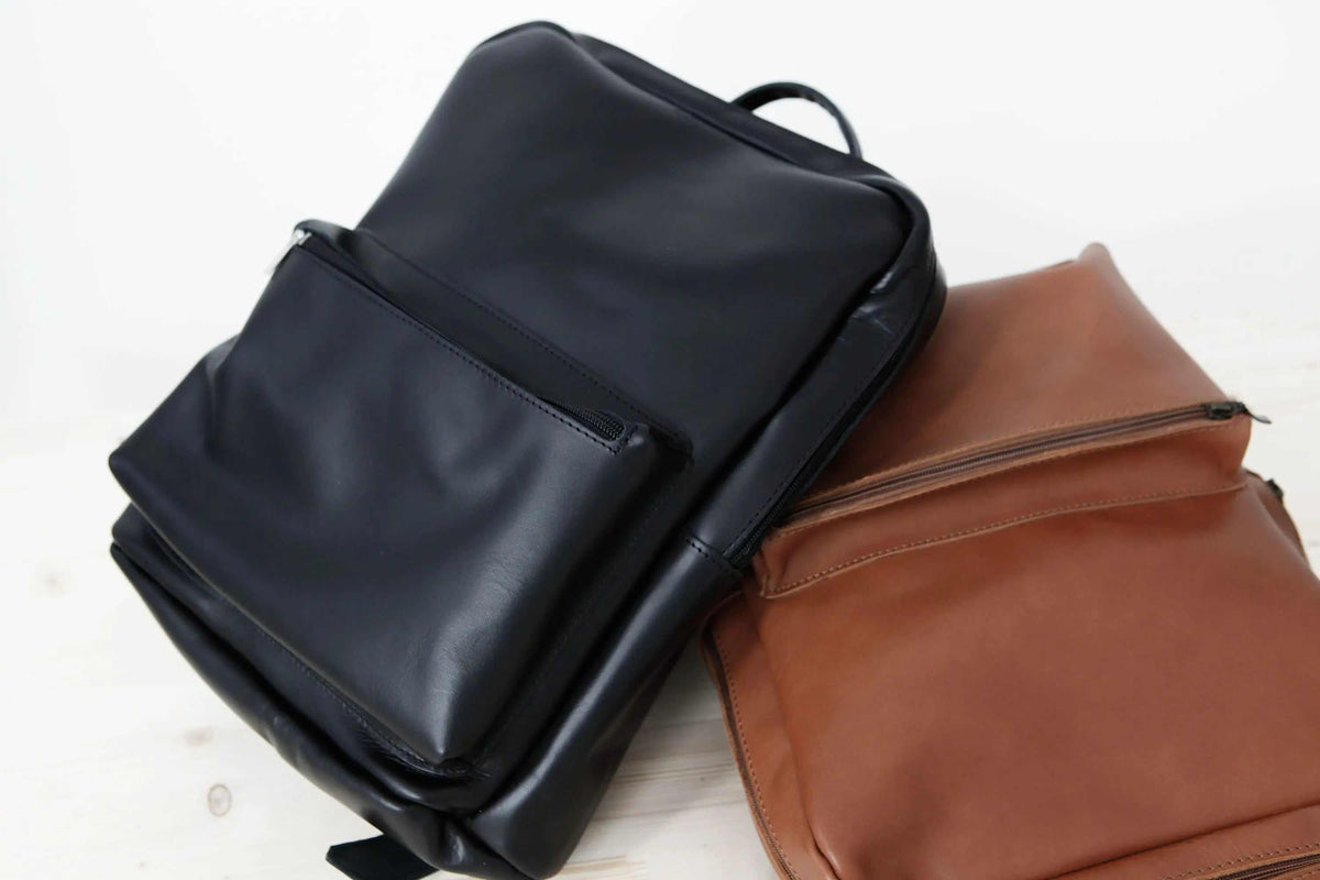 XLARGE BACKPACK leather rucksack in black and camel with front zip pockets and top handles