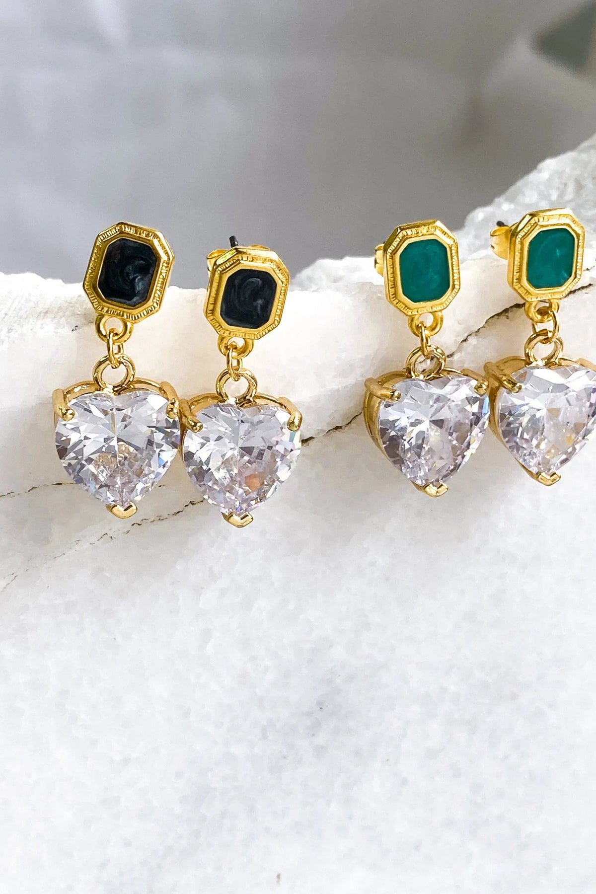 Zircon Heart Earrings with gold-tone settings, dark green rectangular studs and large clear heart-shaped stones